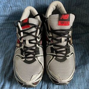 New Balance mens 580 v3 running shoes in gray, red and black. 11